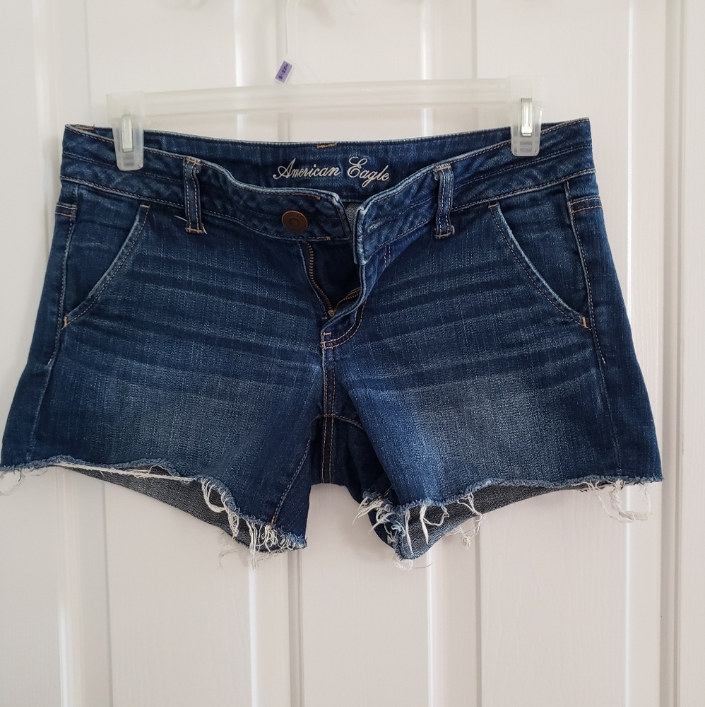 Stretch jean shorts with button detail on back